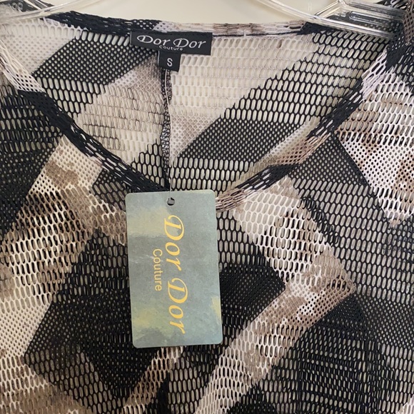 Dor Dor Couture Tuinc - Picture 2 of 8